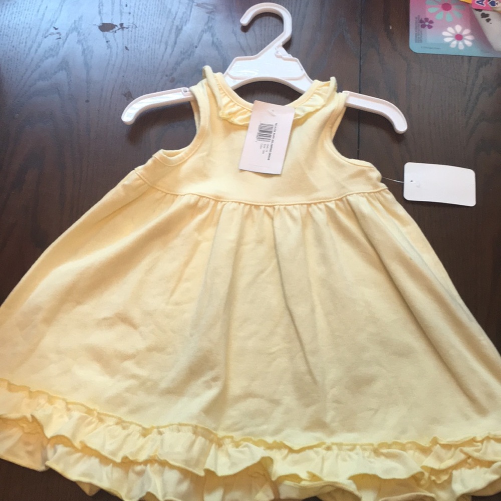 Yellow ruffled empire dress